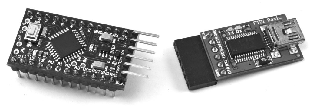 An Arduino Pro Mini and Programmer